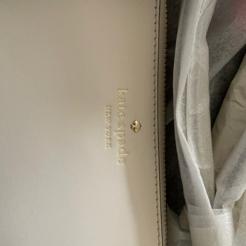 Kate Spade.  Never used. Still wrapped in shipping materials.